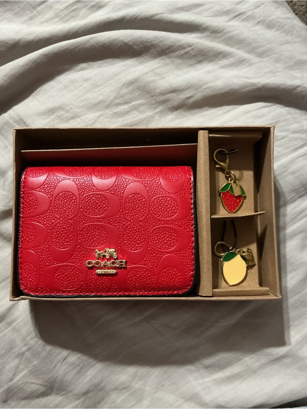 Coach Red Leather Compact Wallet with Fruit Charm Keyrings